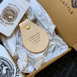 Load image into Gallery viewer, Leather Key fob with the saying &quot;a smooth sea never made a skilled sailor&quot; in a gift box 
